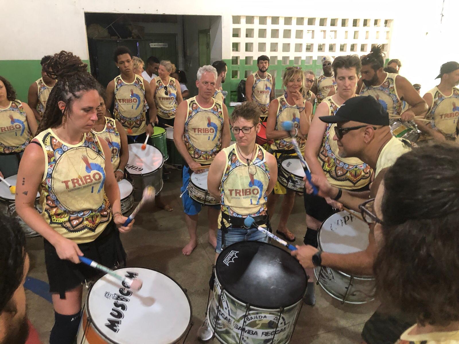 Tribo ensemble rehearsing samba-reggae indoors