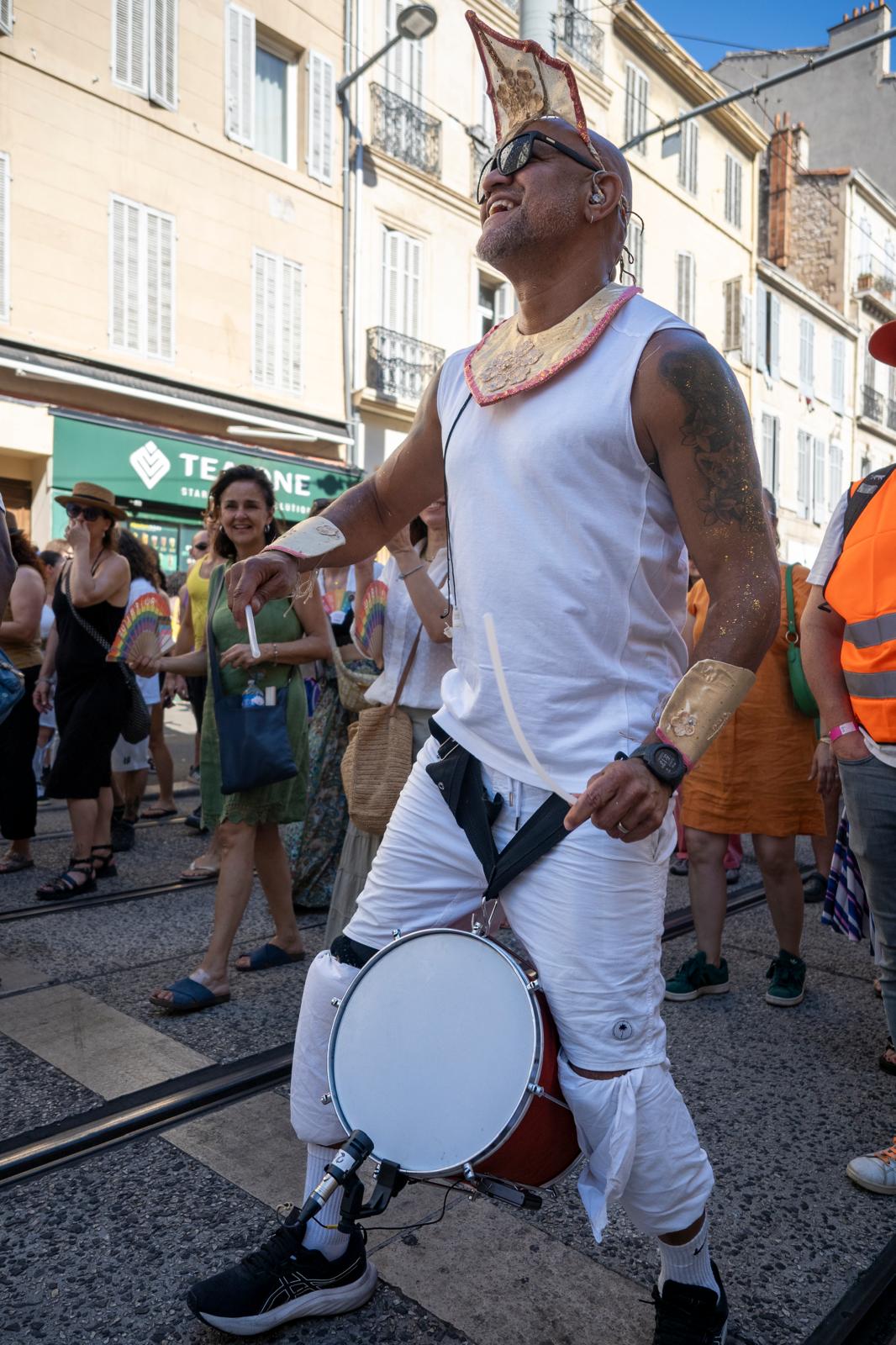 Marcos Santana playing caixa at the head of the Marseille Pride parade
